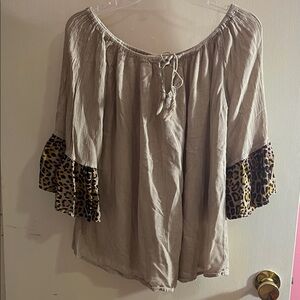 Elegant Beige Blouse with Leopard Print Sleeves